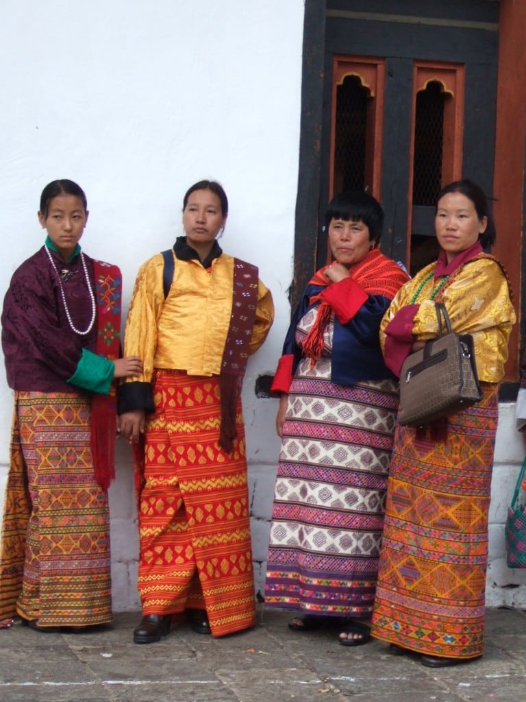 Bhutanese women wearing Kira and Tego. Photo courtesy by Cfynn via Wikimedia Commons