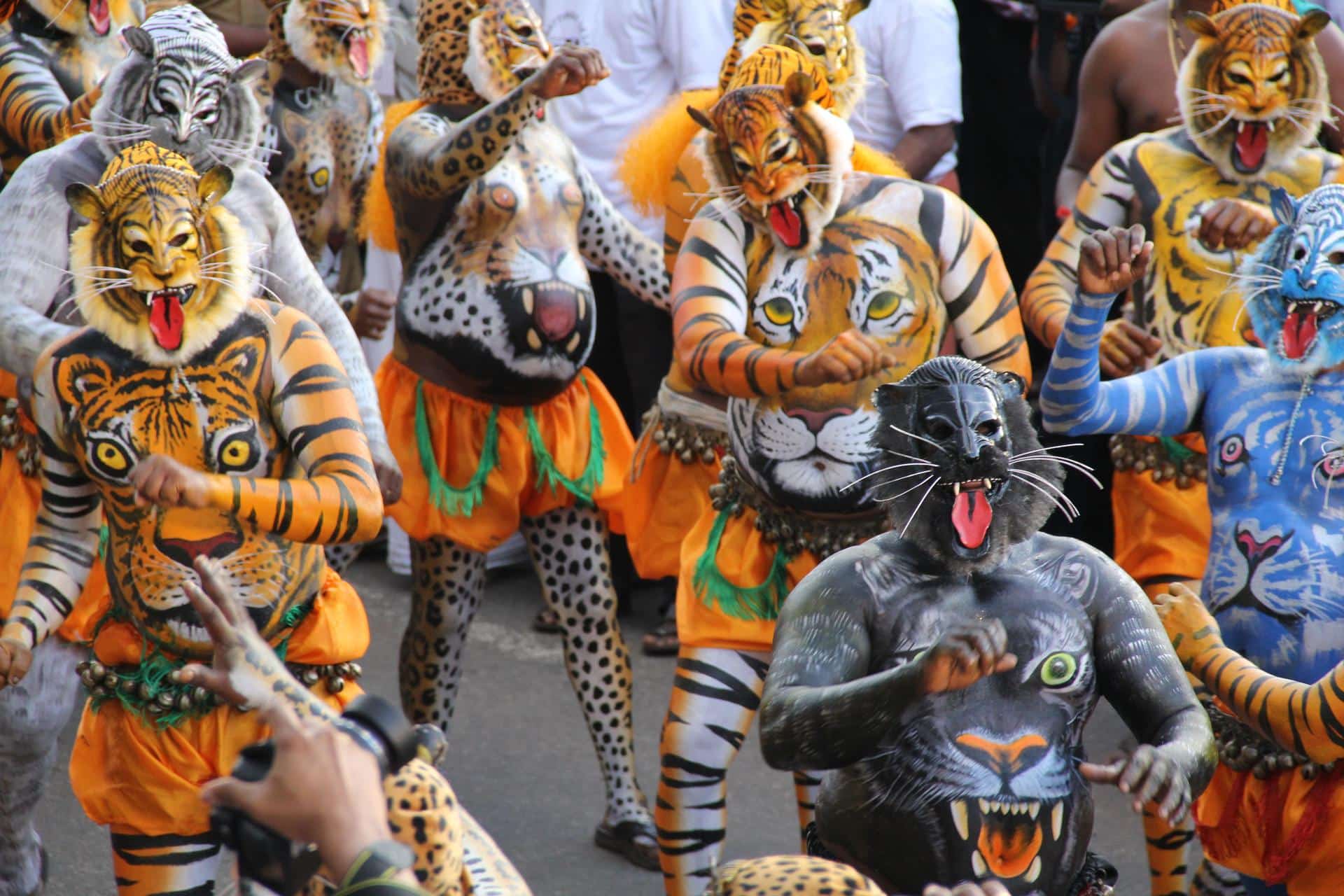 Experience the Pulikali Tiger Festival and the Kerala Onam Festival